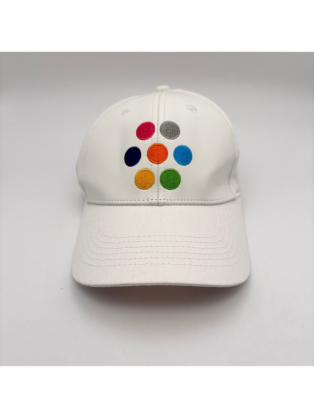 White Baseball Cap with Multicolor Circle Embroidery and Adjustable Strap